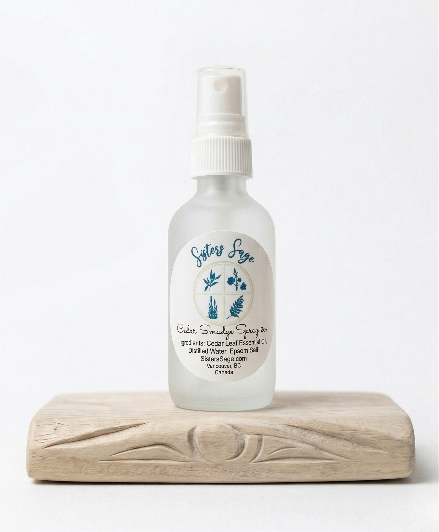 Sisters Sage cedar smudge spray bottle on a white background