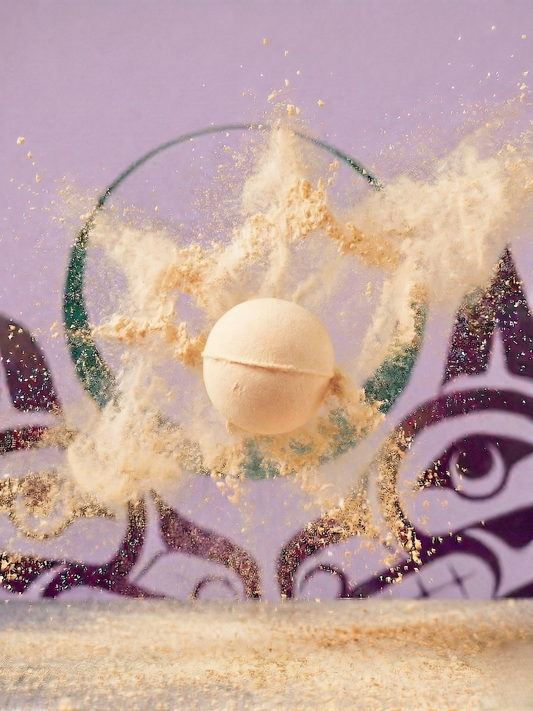 Yellow Bath bomb with decorative elements on a purple background