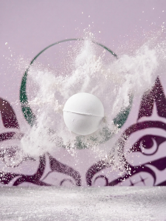 White coloured, sage bath fizzie with sisters sage logo in the background