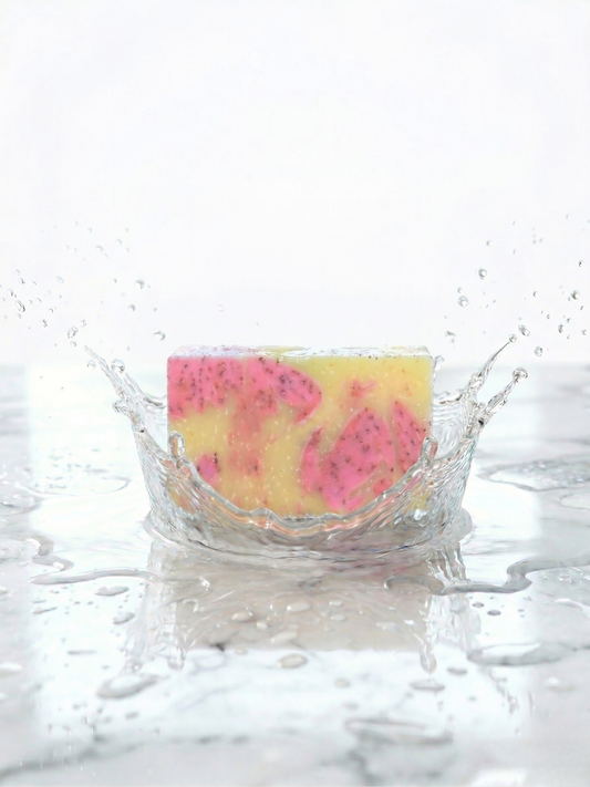 yellow and pink soap water droplets on a white background